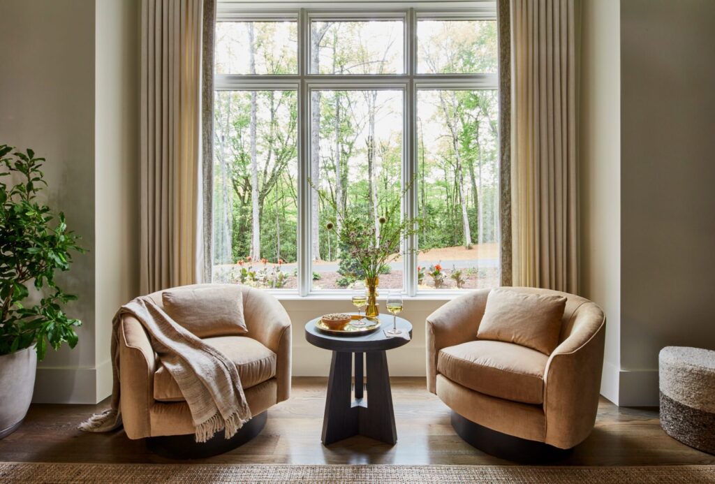 Luxurious sitting room with large, Pella Lifestyle Series window